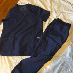 Figs - Navy blue two pocket scrub top and regular length joggers